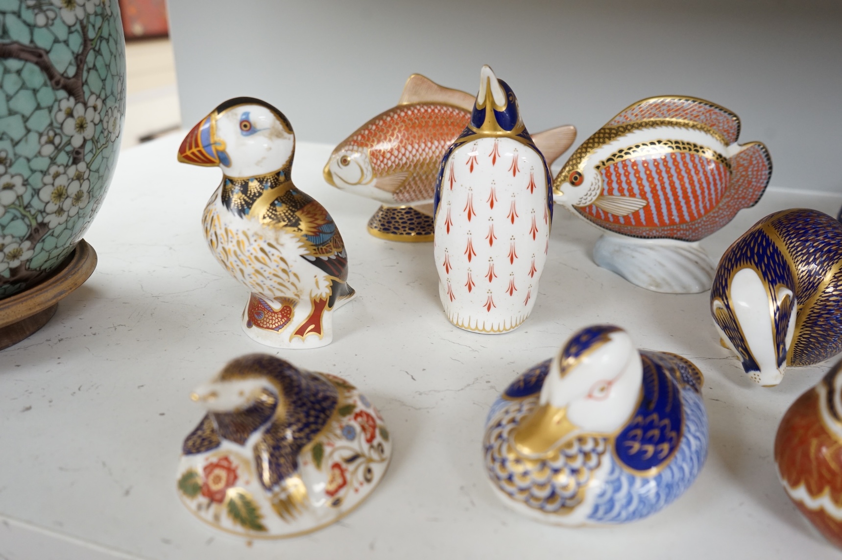 A collection of Royal Crown Derby Imari animal paperweights to include cats, fish and birds, largest 14cm high